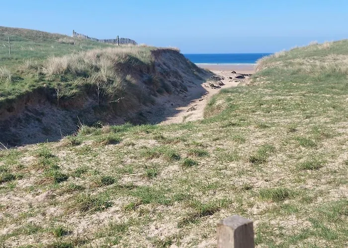 Dans Les Dunes بيت للعطل